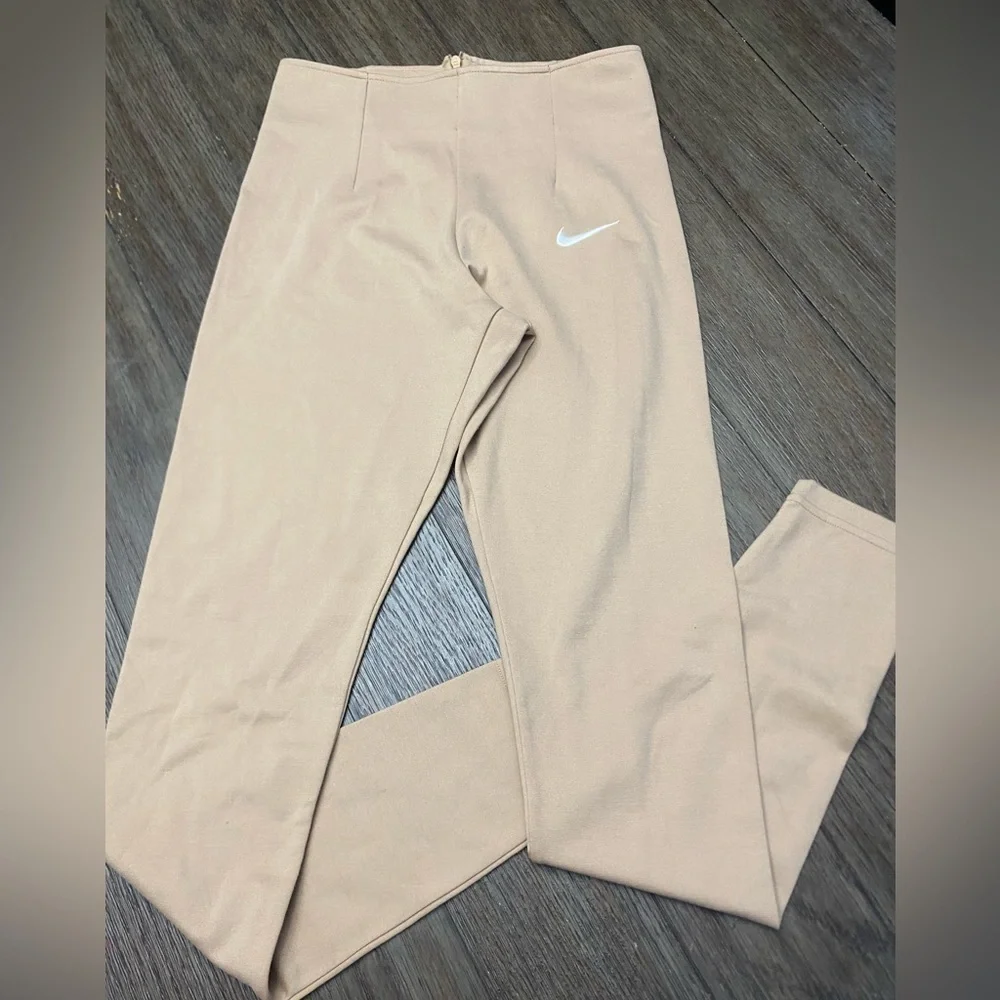Nike embroidered-swoosh detail leggings pleated front size small